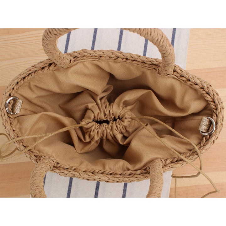 Handbag made of woven natural material with fashionable fringes Skanto