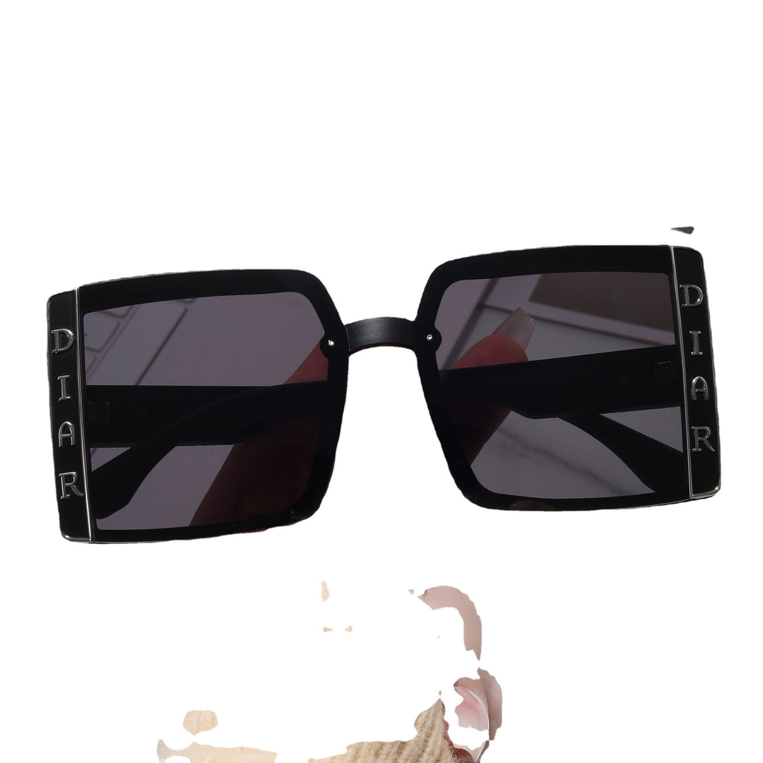 Dame solbrille i moderne kvadratisk design Skanto