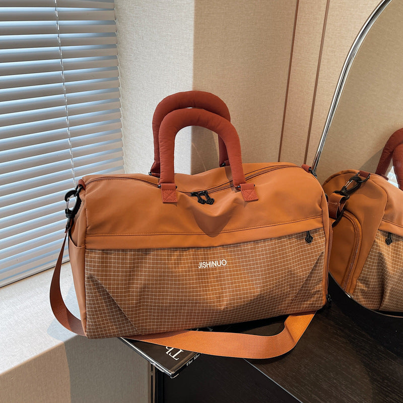 Sporty fritids-duffelbag med ergonomiske håndtak og flere rom Skanto