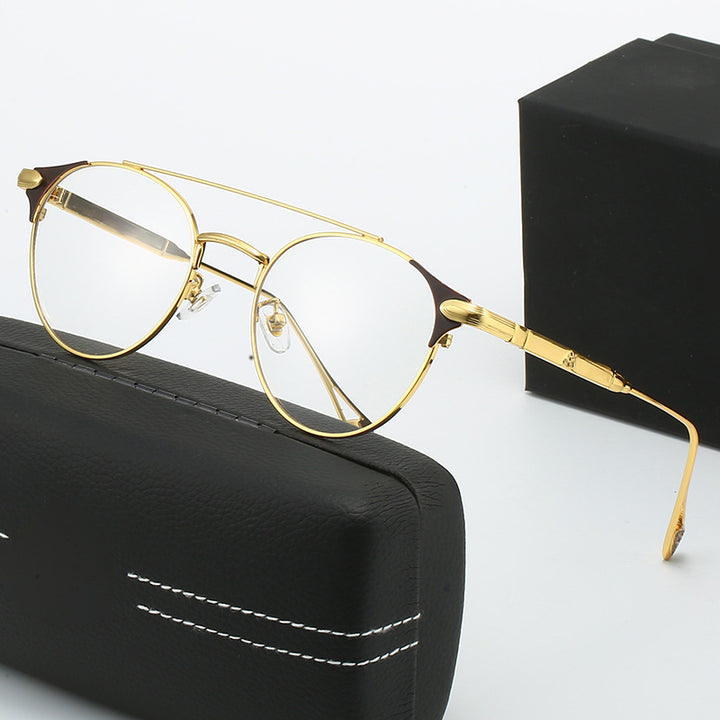 Dame rund Vintage-solbrille med høykvalitets metallramme og robust design Skanto
