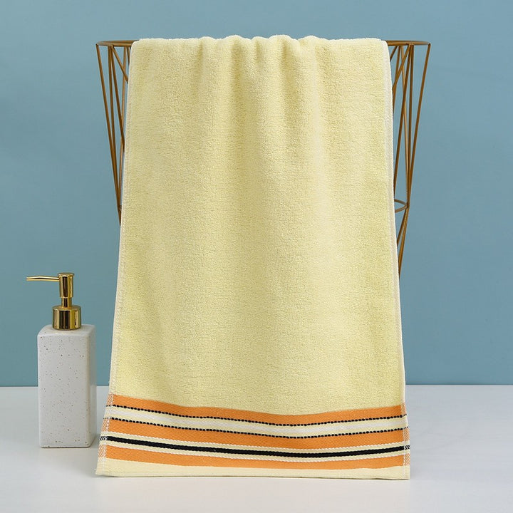 Premium terry towel with elegant stripe border.
