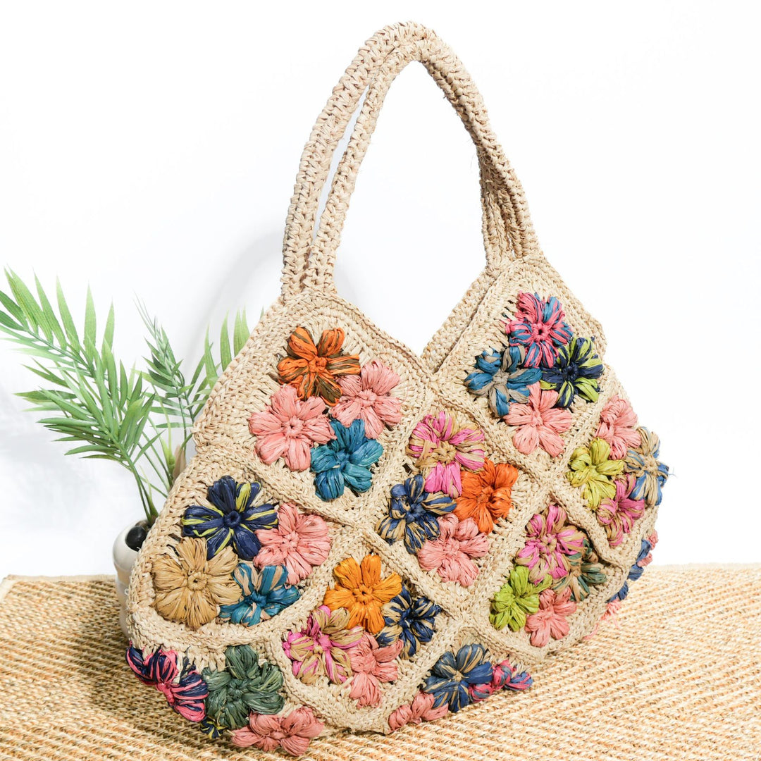 Håndlaget crossover-veske med blomsterbroderier Skanto