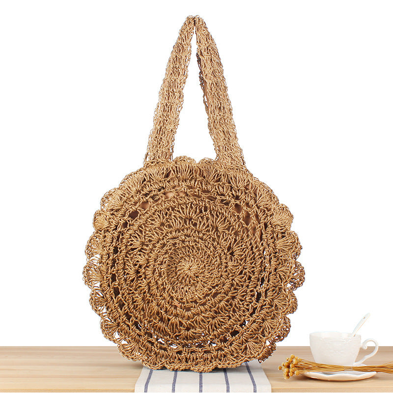 Hand-knotted beach bag with artistic round design Skanto