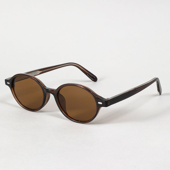 Dame moteriktig solbrille i oval design med stilige detaljer Skanto