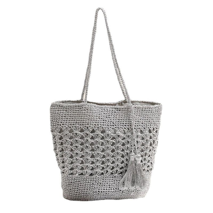 Heklet bærenett med elegante dusker Skanto