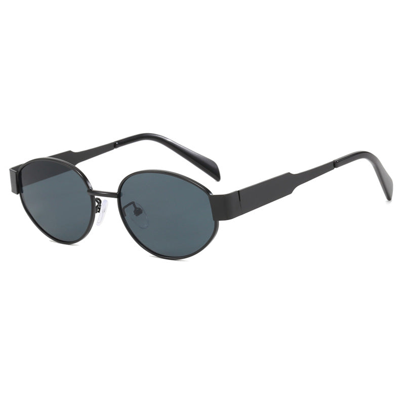 Dame moteriktig solbrille med innovativt geometrisk design Skanto