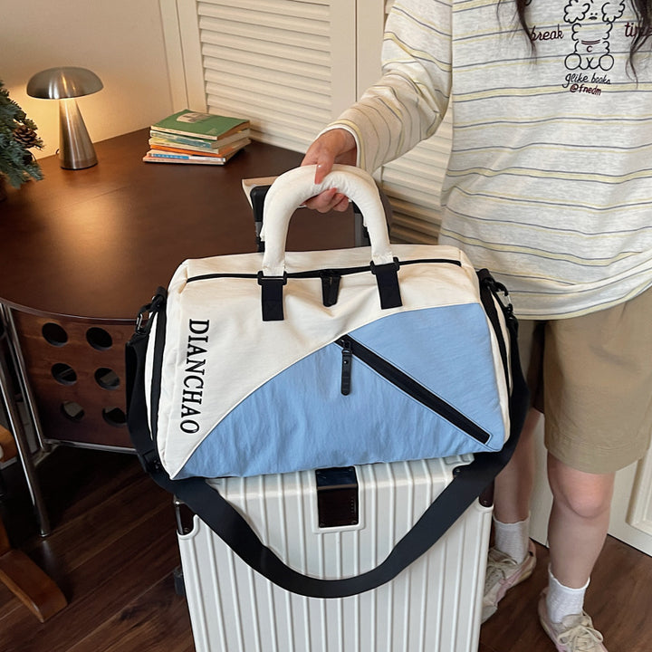Sporty reise bag med forskjellige rom og slitesterkt materiale Skanto