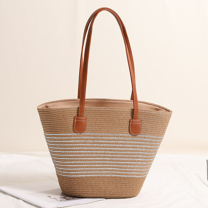 Elegant Bastbag med skinnaksenter Skanto