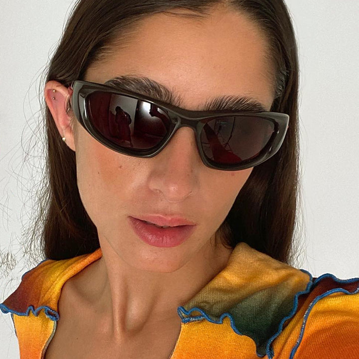 Dame sportlig solbrille med gummiert design Skanto