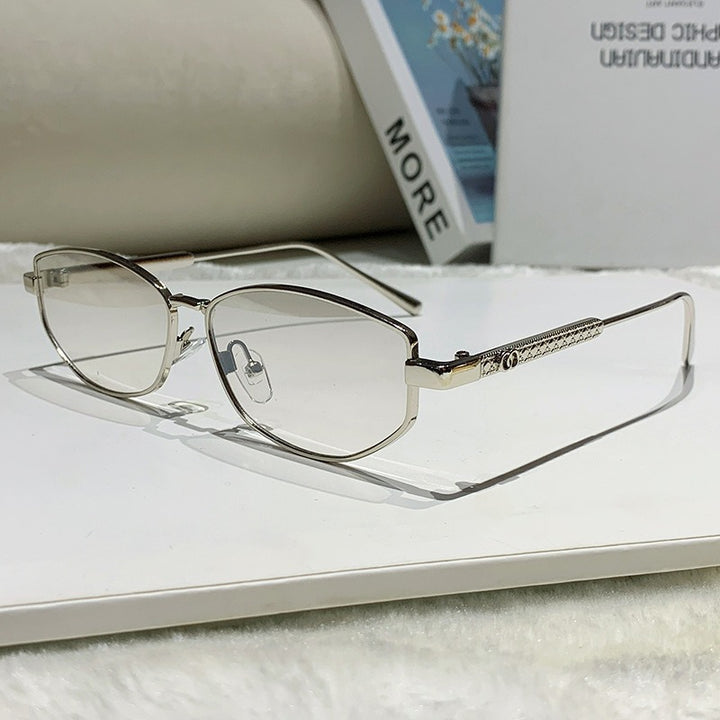 Dame elegant solbrille med glitrende metallramme Skanto