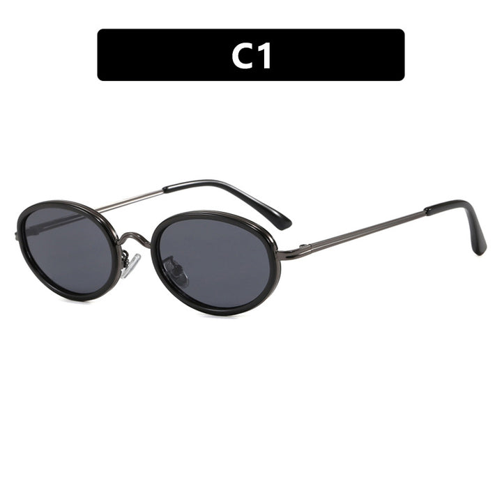 Dame elegant rund solbrille med moderne metallramme Skanto