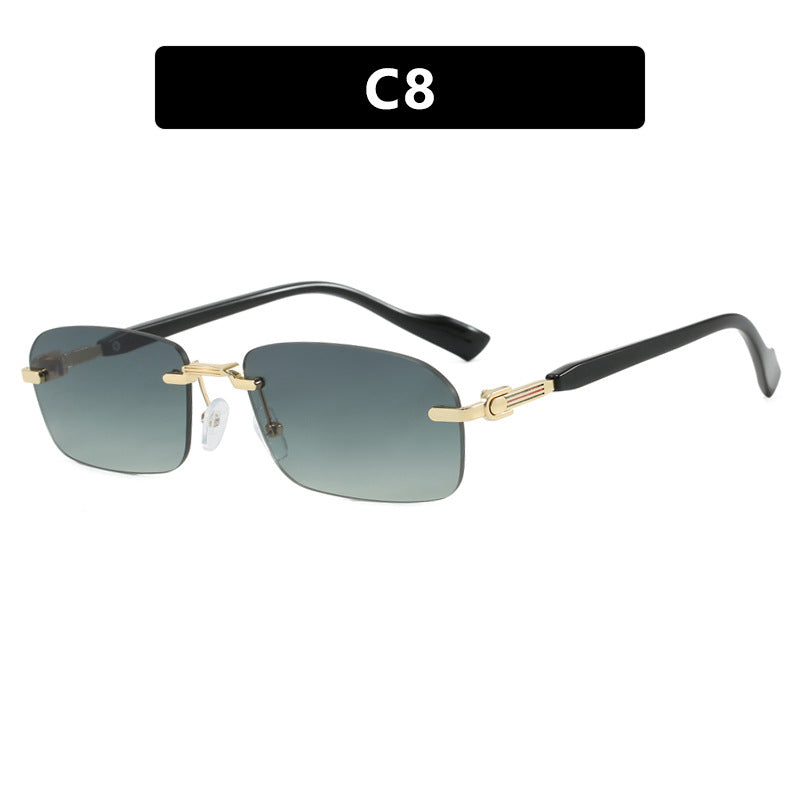 Dame solbrille med elegant metallramme og stilige tre detaljer Skanto