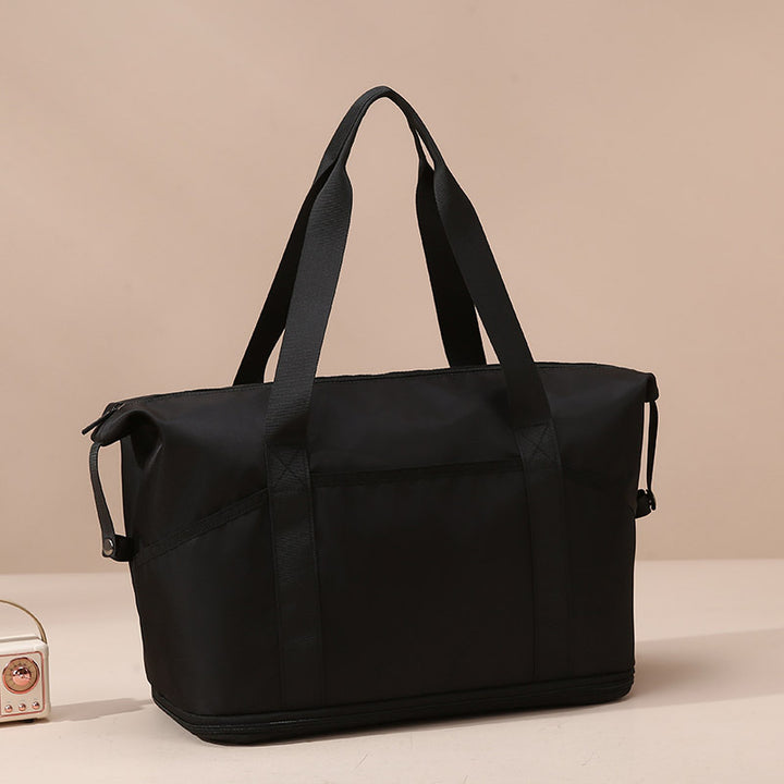 Romslig og funksjonell handlebag Skanto