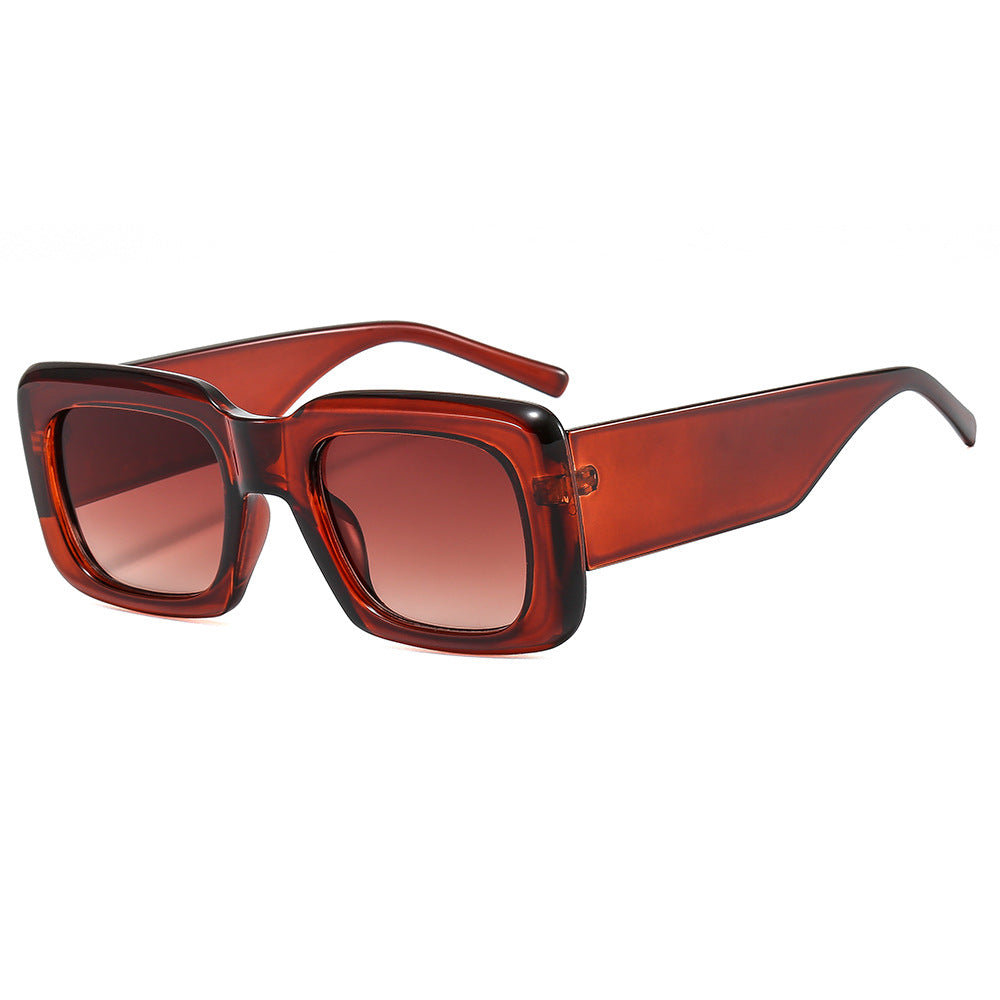 Dame oversized solbriller med kvadratisk ramme og transparent design Skanto