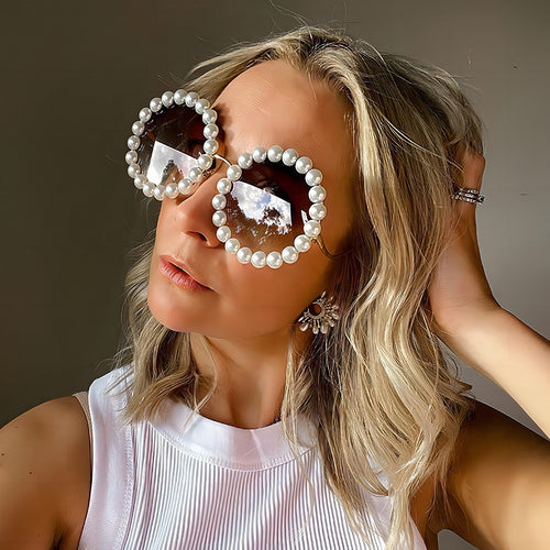 Dame designer-solbrille med perlebesatt ramme Skanto