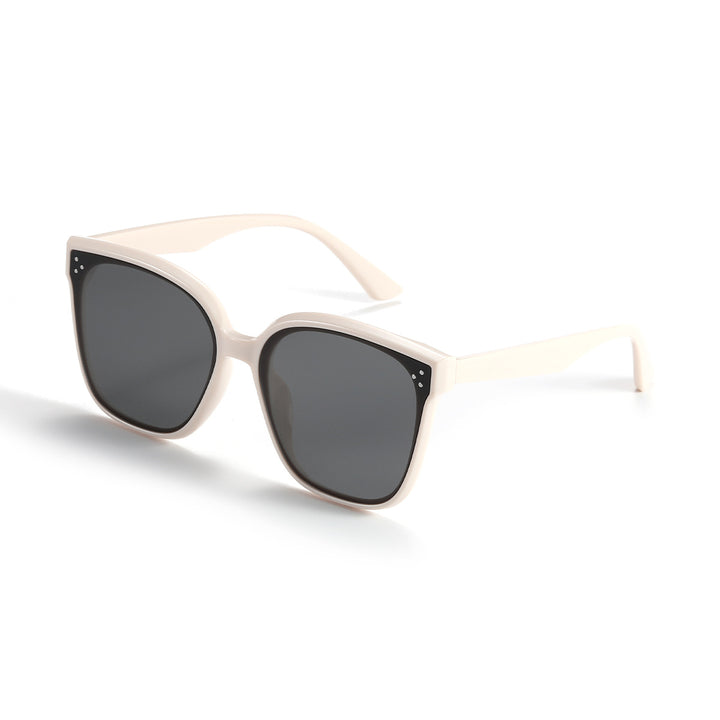 Dame moteriktig solbrille med gjennomsiktig aksent Skanto