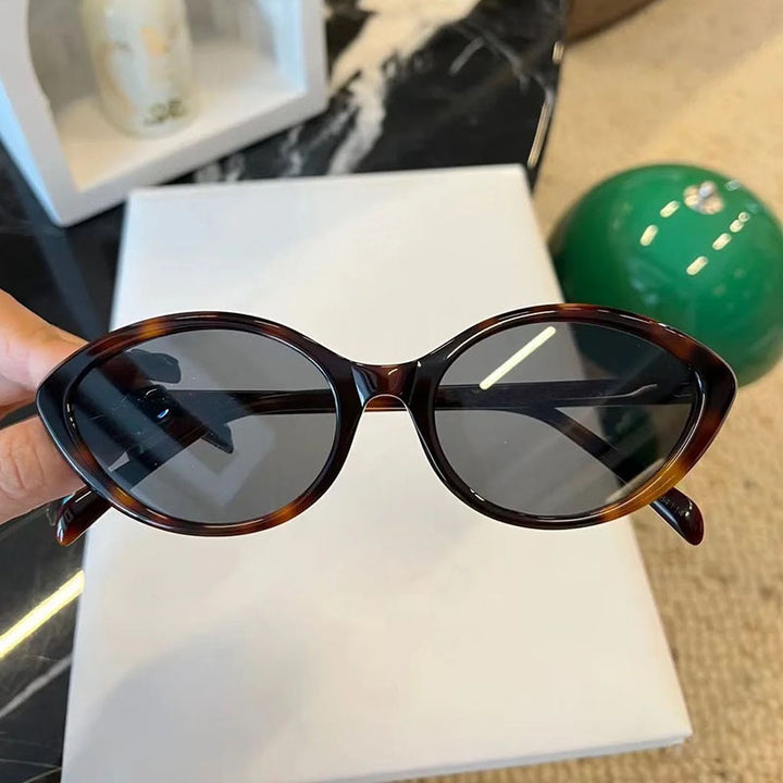 Dame Cat-Eye solbriller med stilig design og beskyttende UV-filter Skanto