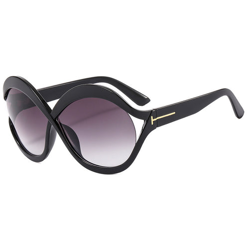 Dame ekstravagant formet solbrille Skanto