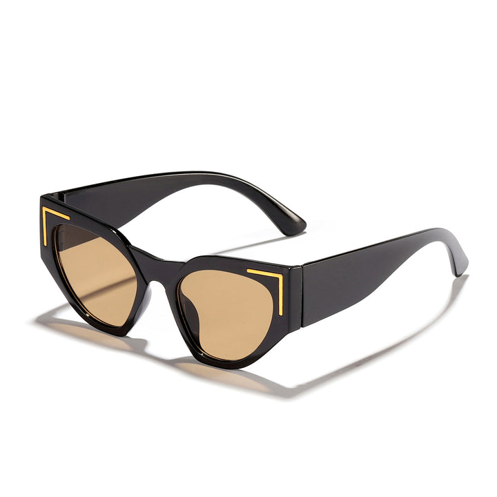 Dame kreativ Cat-Eye solbriller med transparent ramme og brune glass Skanto