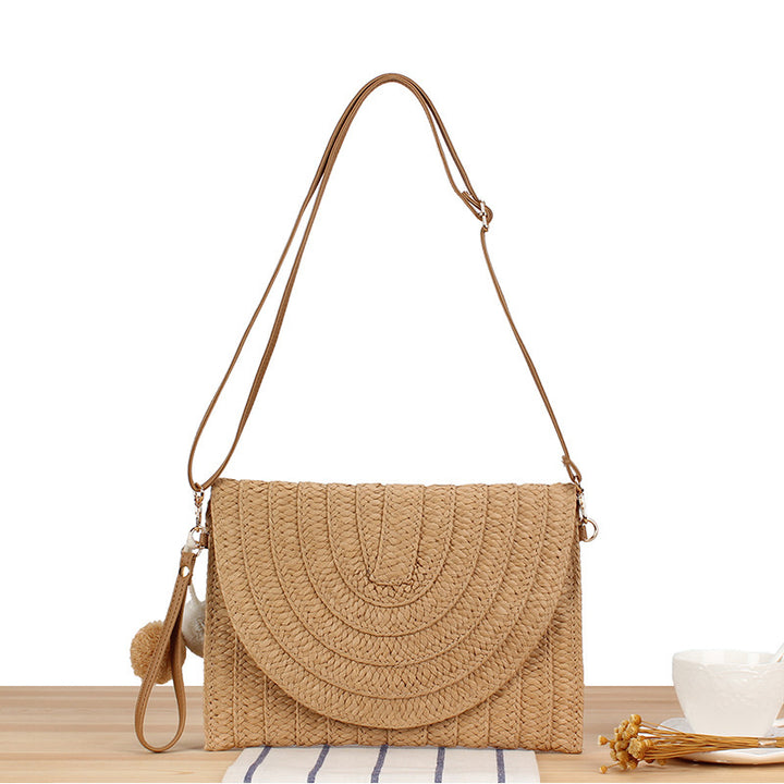 Woven natural material shoulder bag with original wave pattern Skanto