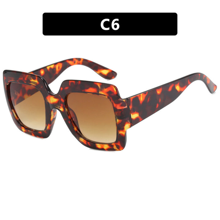 Dame oversized kvadratisk solbrille med markant skjoldpatt-design Skanto