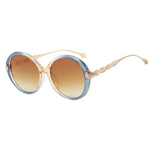 Dame stor rund solbrille med dekorative metalakser Skanto