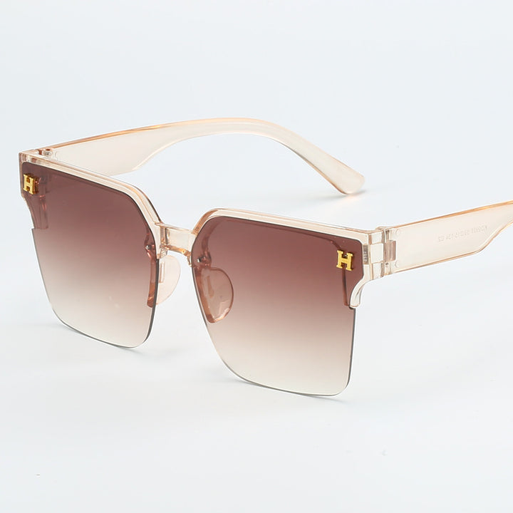 Dame kvadratisk solbrille med elegant metallramme Skanto