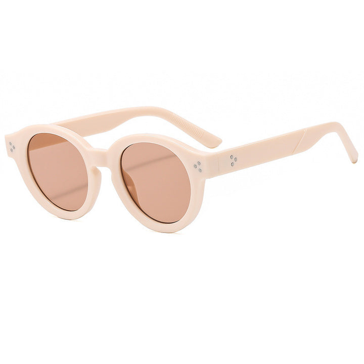 Dame moteriktig solbrille med klar og strukturert ramme Skanto