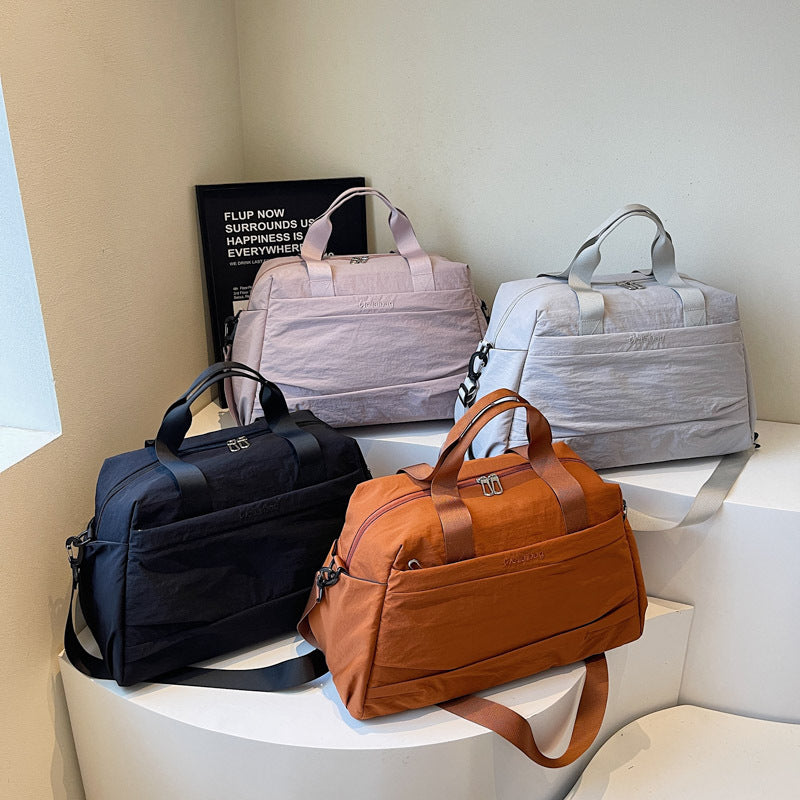Elegant og romslig sport crossover bag Skanto