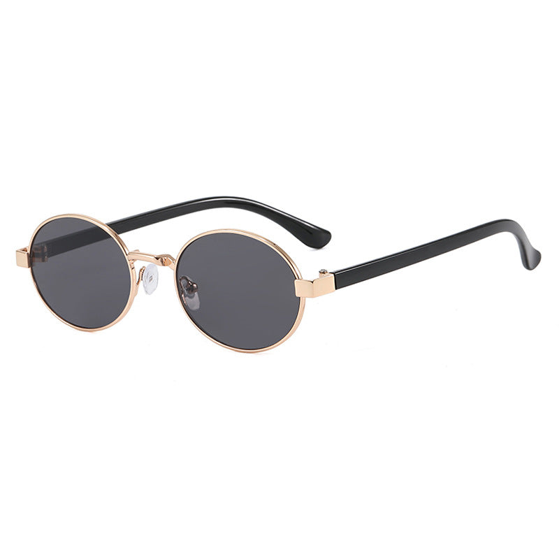 Dame rund brille med elegant metallramme og justerbare nesepads Skanto