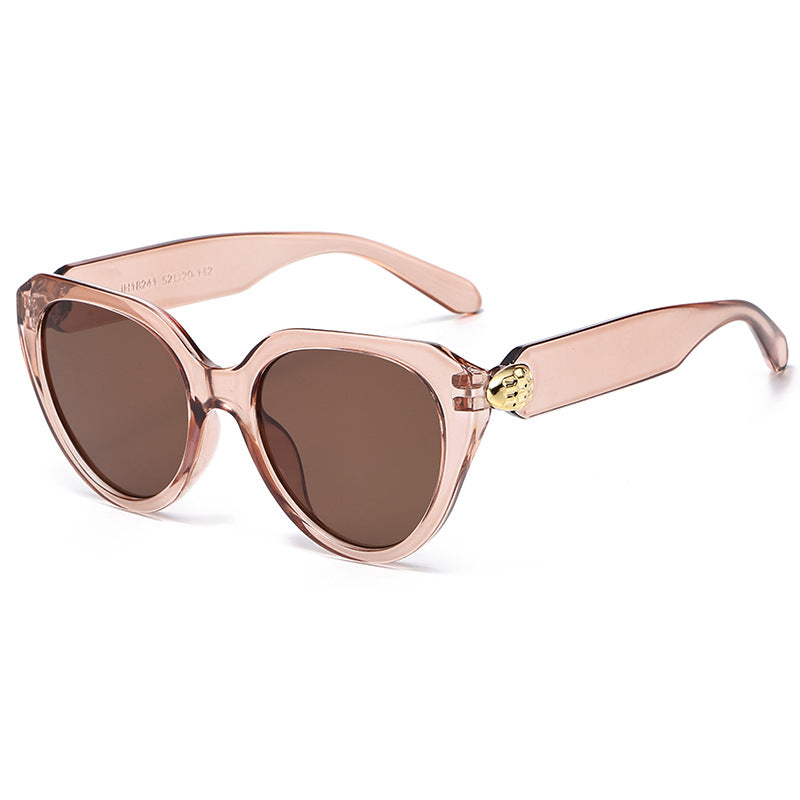 Dame Cat-Eye solbriller med gullige detaljer og beskyttende UV-filter Skanto