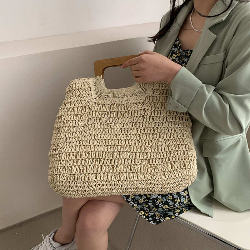 Designer håndveske med praktisk trehåndtak Skanto