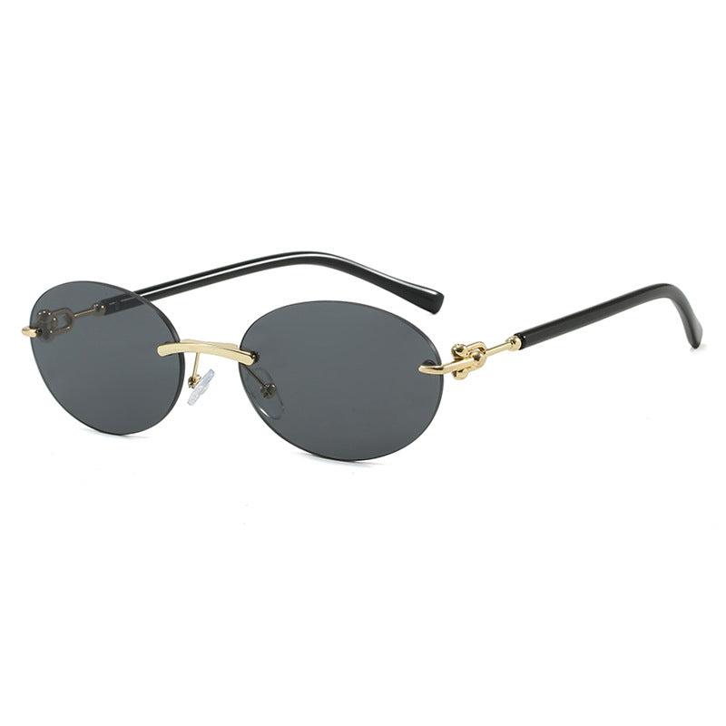Dame oval solbrille med luksuriøs metallramme og speilbelagte glass Skanto