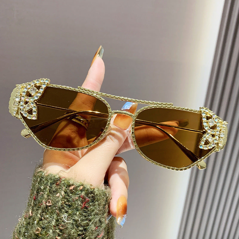 Dame luksus solbrille med elegant sommerfugl-detalj Skanto