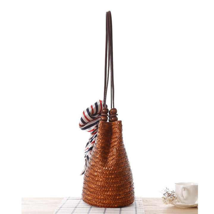 Elegant basket bag with stylish ribbon detail Skanto
