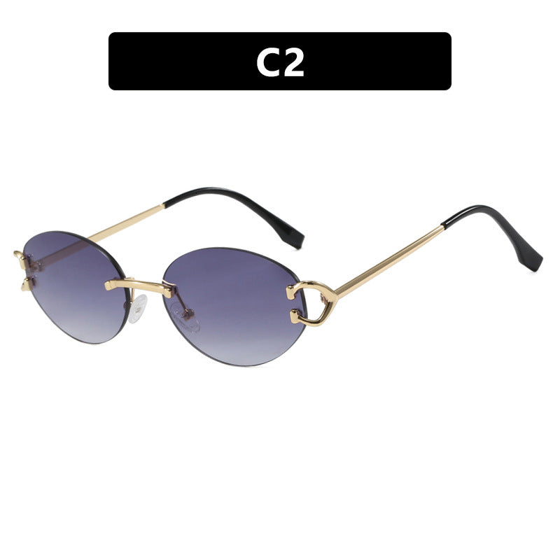 Dame elegant ovalformet solbrille med moderne metalramme Skanto