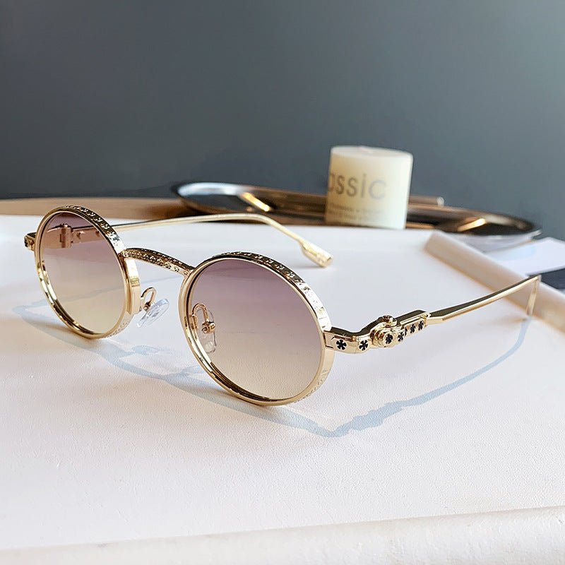 Dame Elegant solbrille med filigran detaljer Skanto
