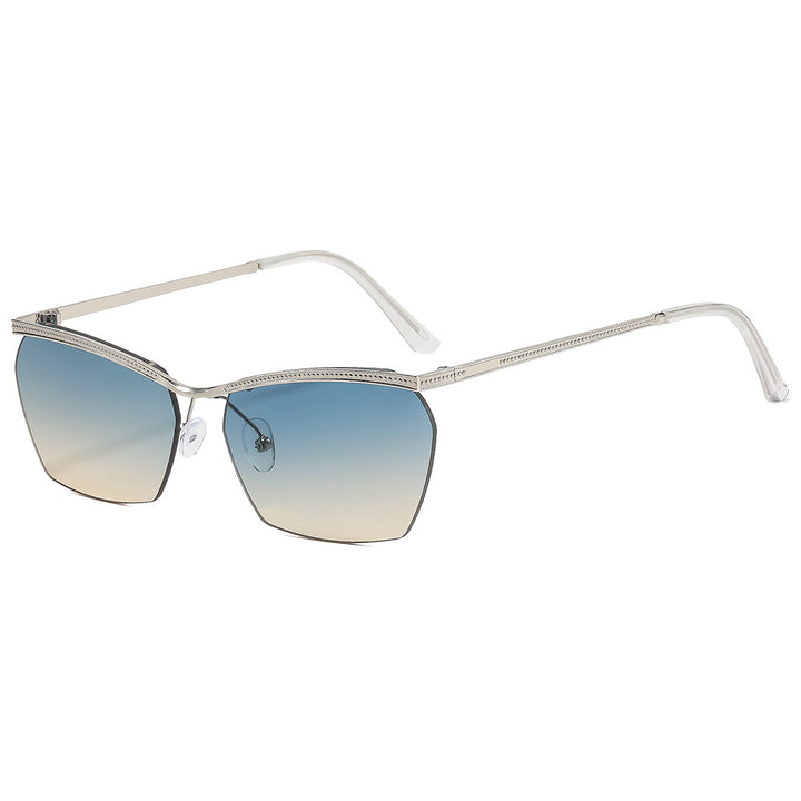 Dame moterik solbrille med filigran ramme og myk fargegradient Skanto