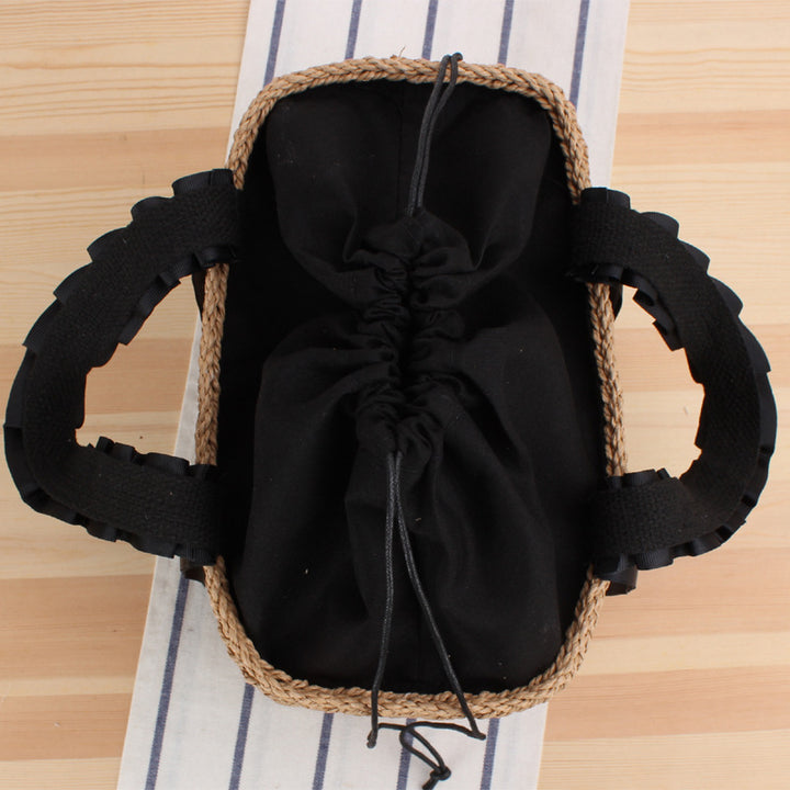 Playful basket bag with elegant fabric handle Skanto