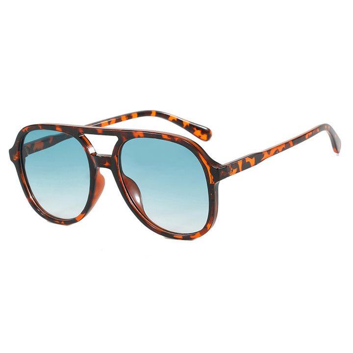 Dame solbrille med elegant skilpaddemønster og UV-beskyttelse Skanto