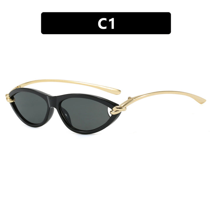 Damen Cat-Eye solbriller med elegant metallramme og beskyttende UV-filter Skanto