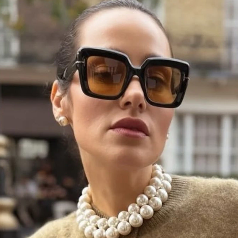 Dame firkantet solbrille med komfortabel plastramme og UV-beskyttelse Skanto