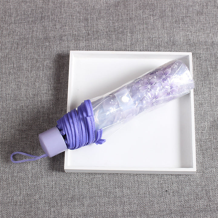 Damer elegant og bærbar paraply med blomsterdesign Skanto
