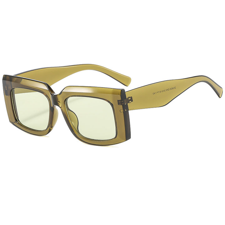 Dame Moda solbrille med markant kvadratisk ramme og UV-beskyttelse Skanto