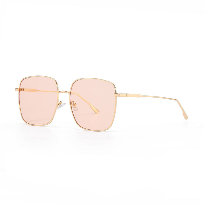 Dame solbrille med moderne firkantet rustfritt stålramme og polarisert glass Skanto