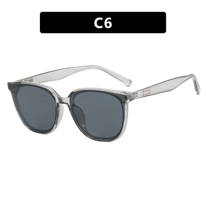 Dame elegant solbrille med trendy gjennomsiktig ramme Skanto