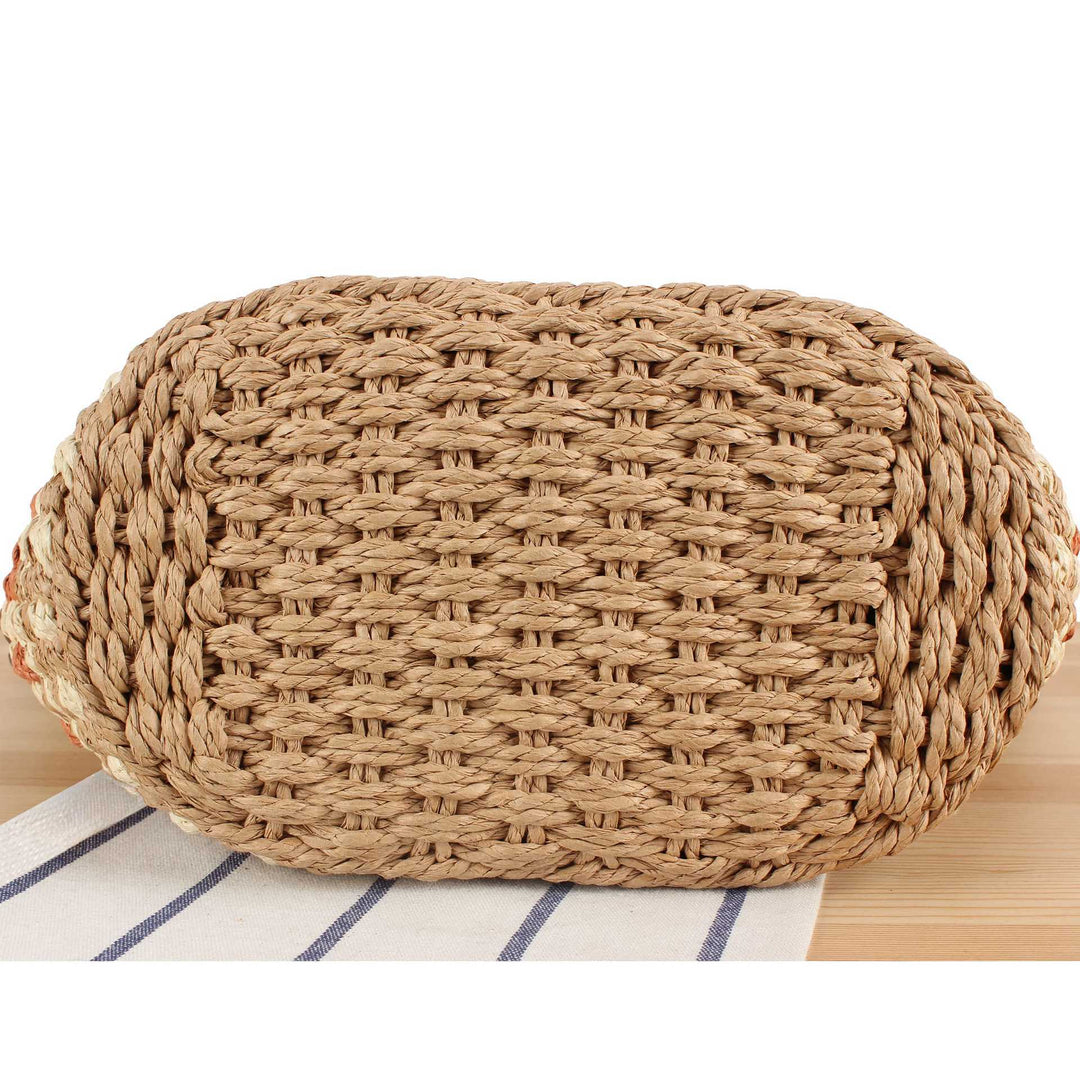 Tote bag made of woven natural material with elegant leather handles Skanto