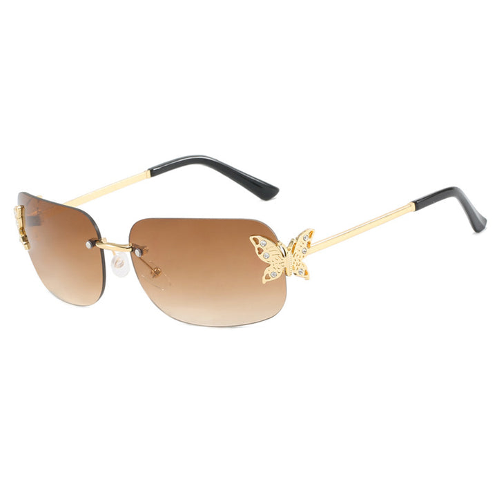 Dame moteriktig solbrille med filigran sommerfugldesign og beskyttende glass Skanto