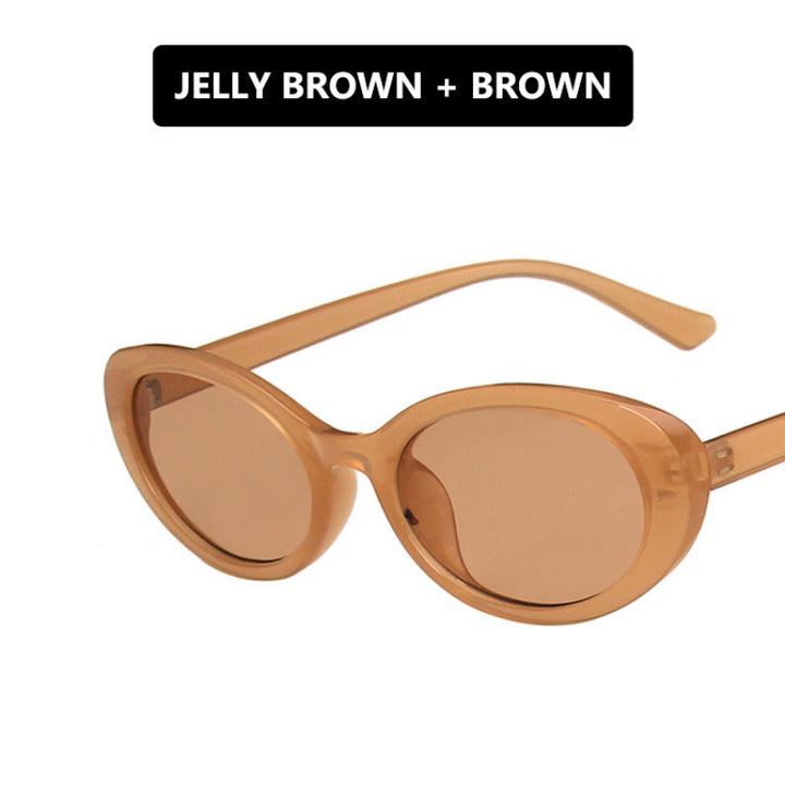 Dame Cat-Eye solbriller med gjennomsiktig ramme og gradient linser Skanto
