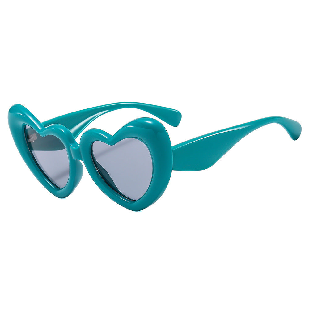 Dame Hjerteformet Solbrille med stilfull innramming Skanto